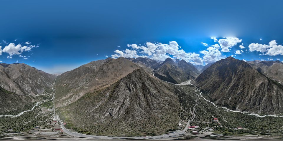 Spherical panorama of Ala-Archa gorge with mountains and valley.