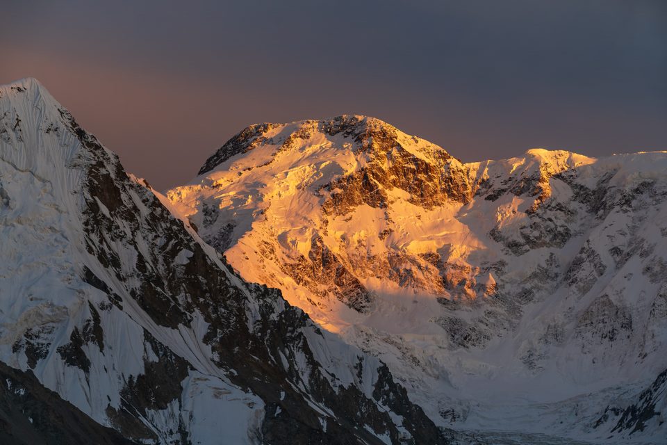 Jengish Chokusu above the Southern Inylchek Glacier at golden hour.
